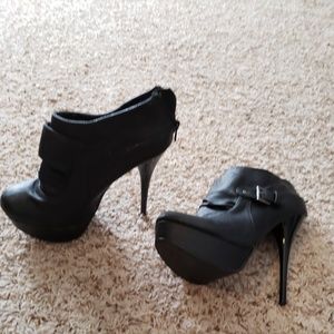 Black booties with high heel